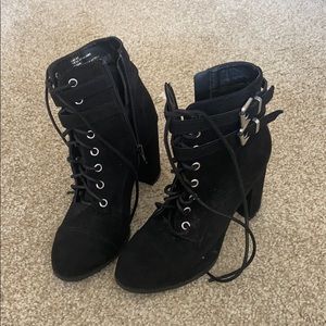 Madden Girl Black lace up heeled boot w/ buckles.